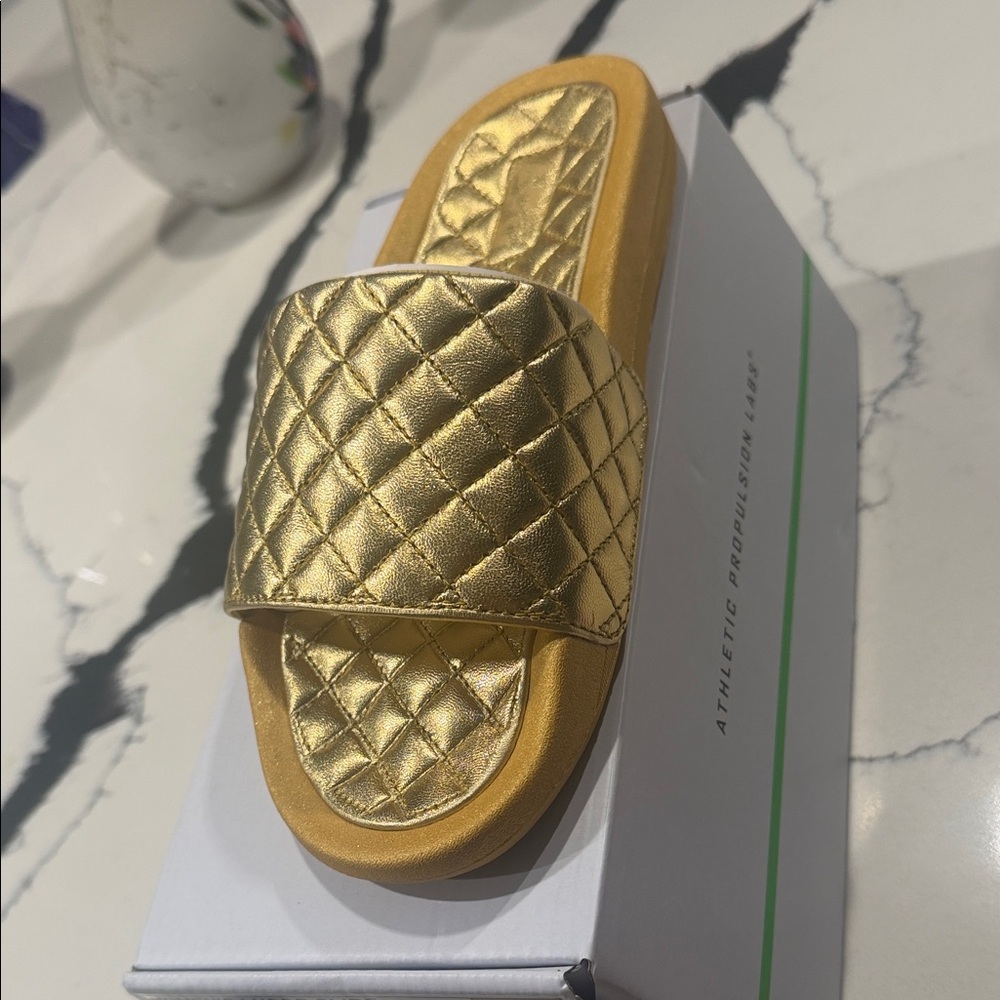 APL Gold Quilted Leather Slide Sandals